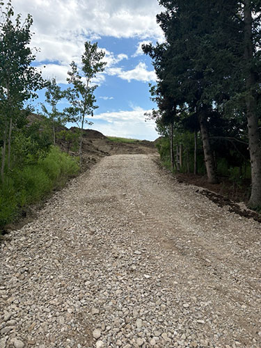 Image 4 - acreage development, road construction by 2 Sons Excavating, serving all excavating needs in and around Calgary, Alberta.
